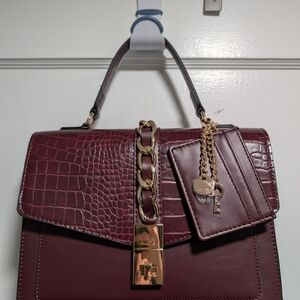 Elegant Burgundy Aldo Handbag with Gold Accents